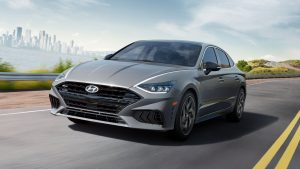 Front view of a gray 2022 Hyundai Sonata being driven on the highway. | Hyundai dealer in Fort Smith, AR.