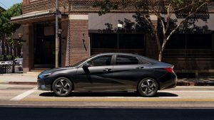 A gray 2022 Hyundai Elantra on the street in front of a building. | Hyundai dealer in Fort Smith, AR.