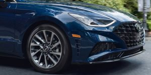 Front view of the grille area of a dark blue 2021 Hyundai Sonata. | Hyundai dealer in Fort Smith, AR.