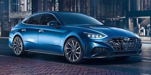 A dark blue 2021 Hyundai Sonata parked on a brick road. | Hyundai dealer in Fort Smith, AR.