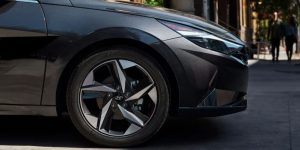 Close view of the passenger front tire of a dark gray 2021 Hyundai Elantra. | Hyundai dealer in Fort Smith, AR.