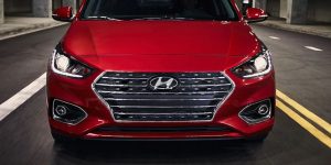 Close view of the grille area of a red 2020 Hyundai Accent. | Hyundai dealer for Fort Smith, AR.