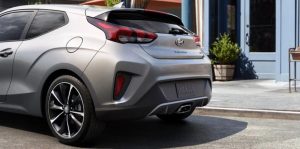 Rear view of a parked, silver 202 Hyundai Veloster. | Hyundai dealer in Fort Smith, AR.