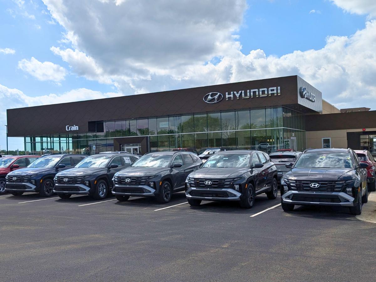 Row of Hyundai SUVs parked outside Crain Hyundai of Fort Smith dealership